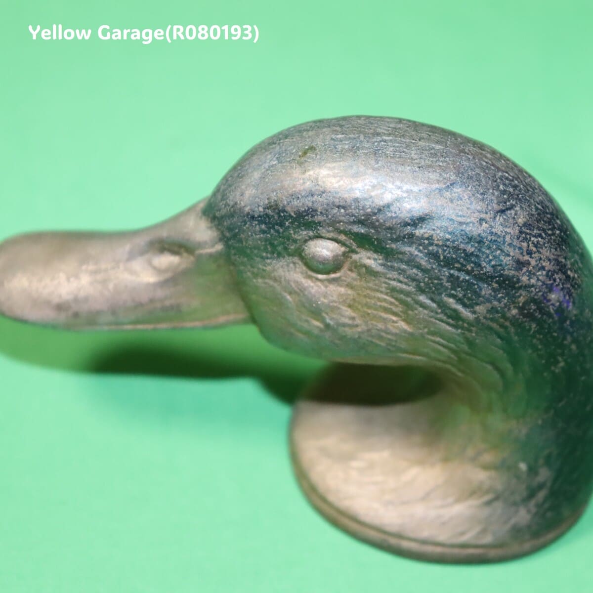 フランス・パリの老舗金物商 KIRBY, BEARD &amp; Co. によって製作されたアヒル（DUCK）をモチーフにした真鍮製ヴィンテージ・ボトルオープナー＿アップ左