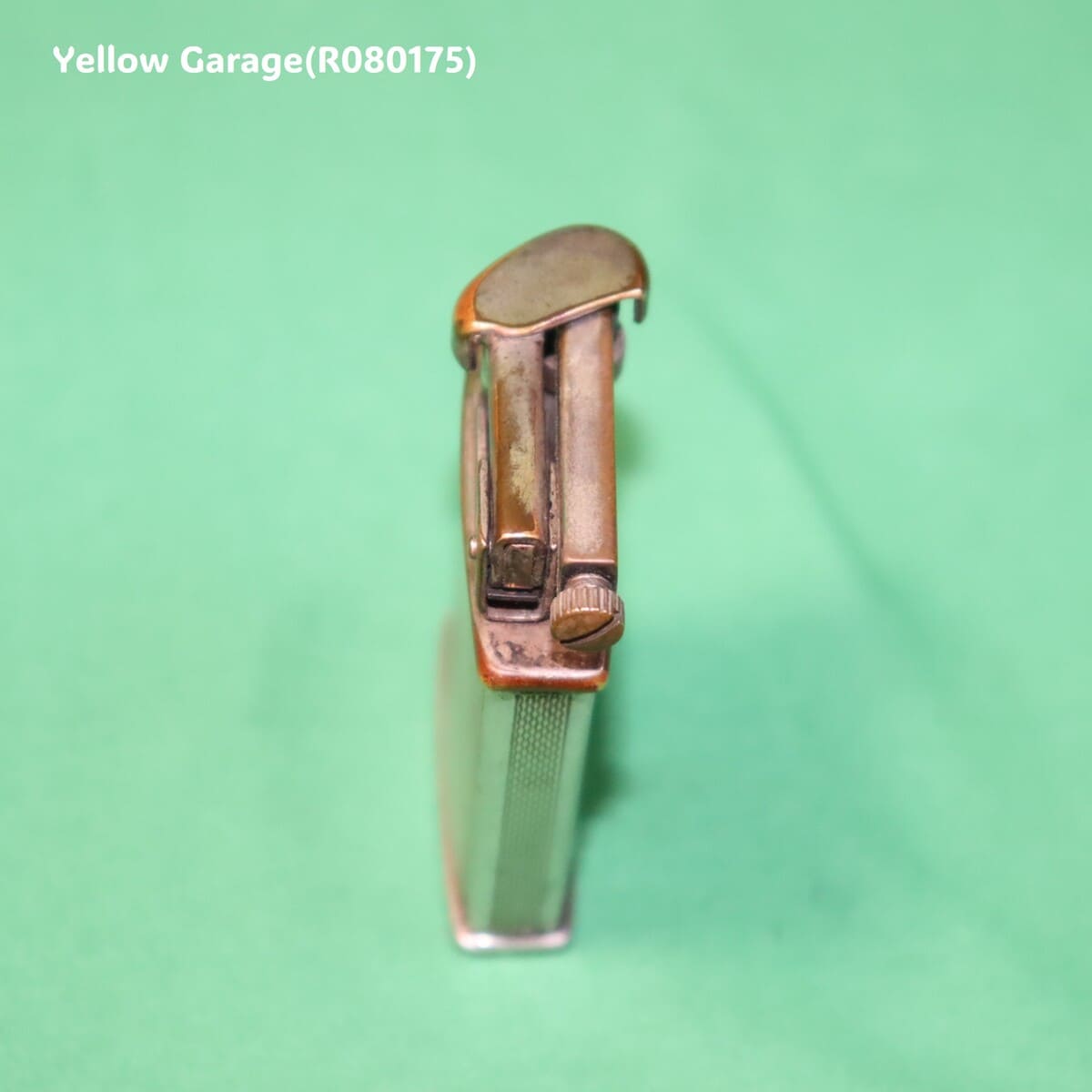 イギリス製のビンテージオイルライター＿あたま縦