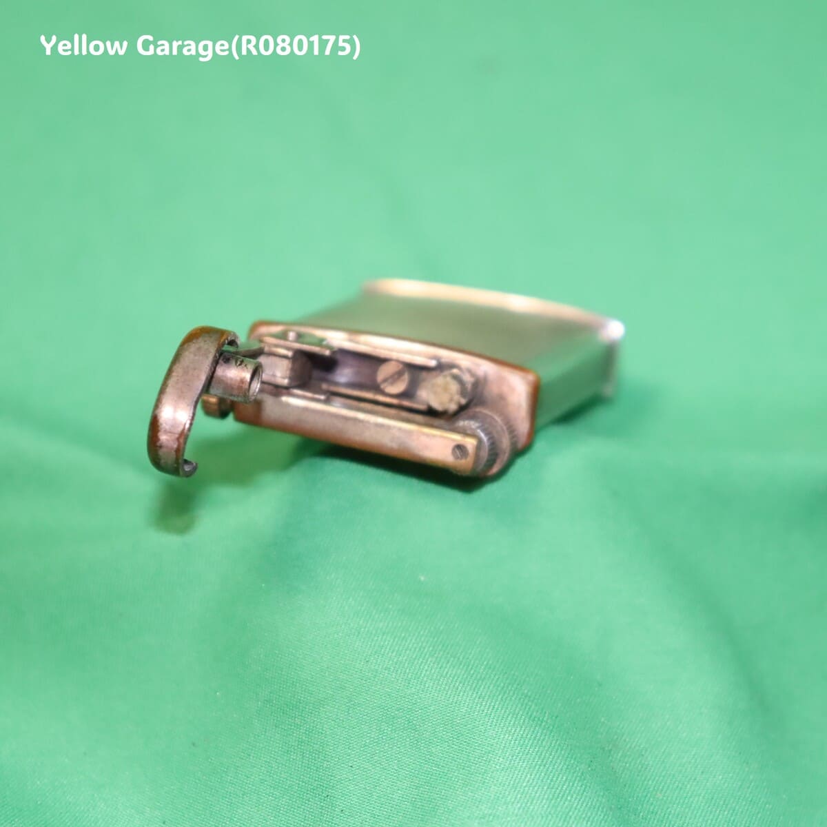 イギリス製のビンテージオイルライター＿あたま正面開き