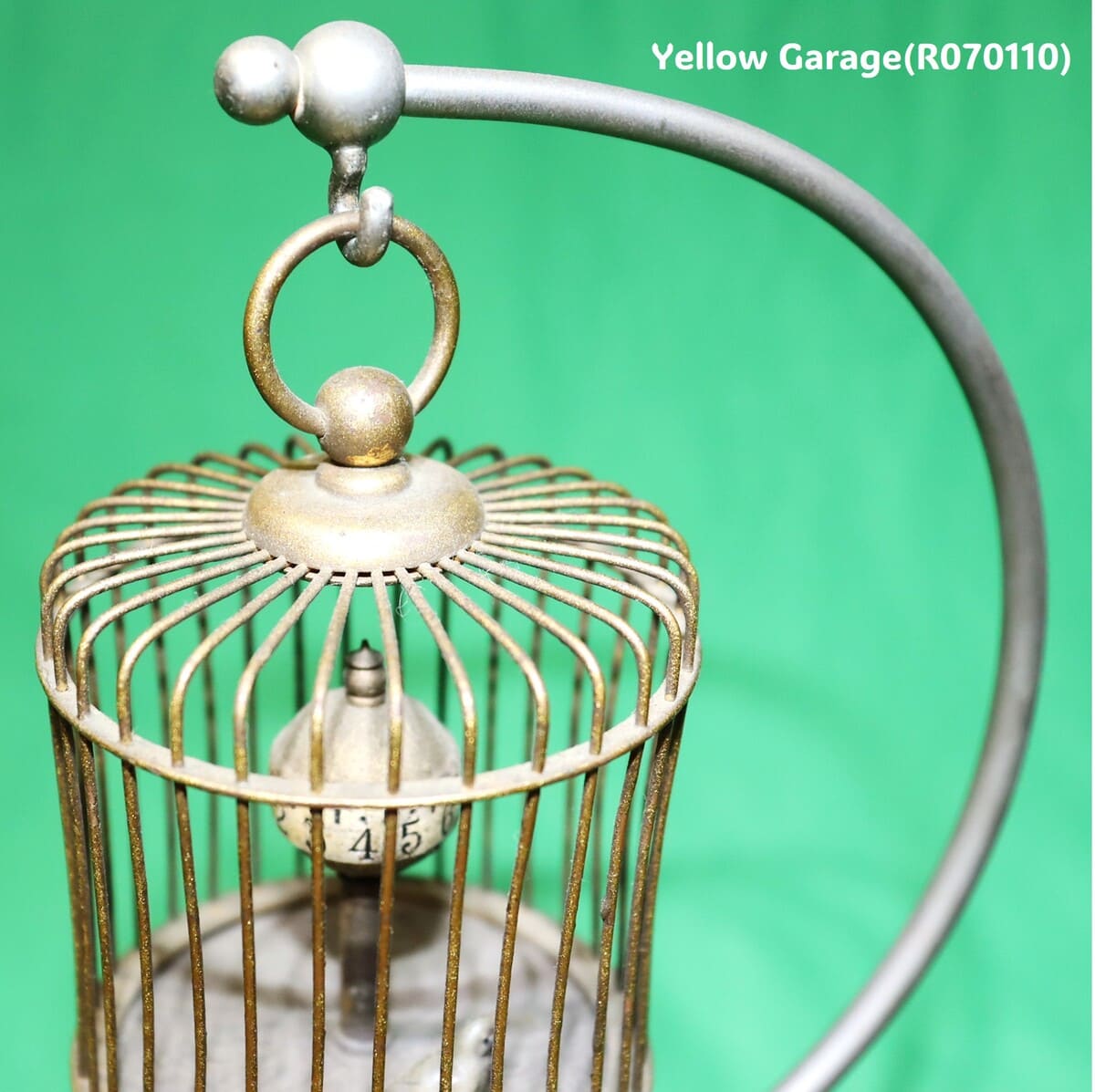 20世紀中頃に製造されたと推定される非常に珍しい鳥かご型のアンティーク時計